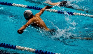 person swimming on marathon