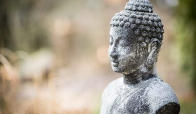 gray concrete statue of Buddha