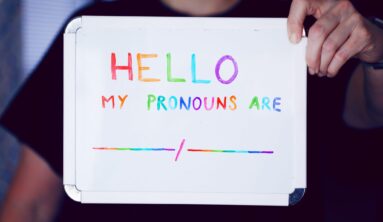 person holding white printer paper
